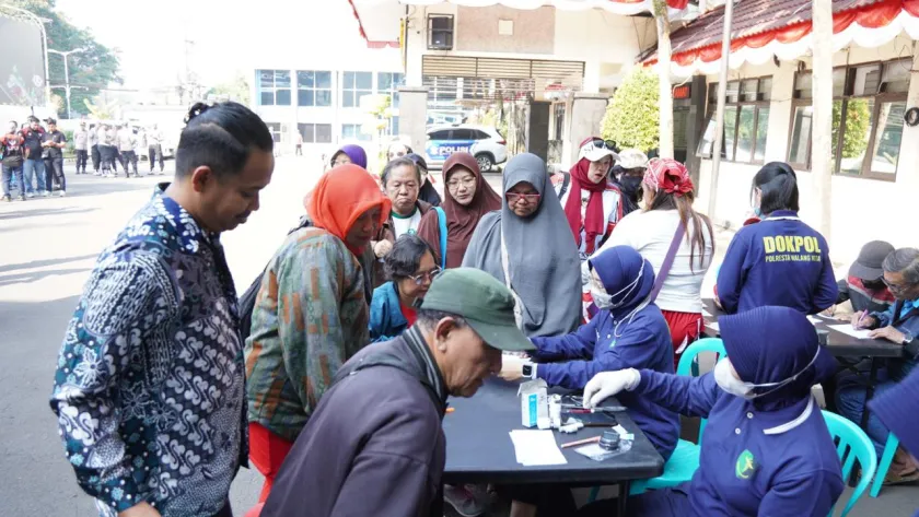 Polresta Malang Kota Gelar Bakkes Ajak Warga Makan Bersama dan Periksa Kesehatan Gratis